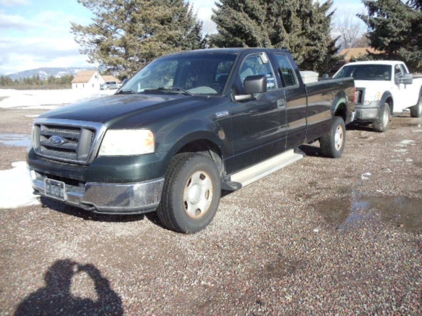 2004 Green /Gray Ford F-150 XL (1FTVX14504N) with an V8, 5.4L; SOHC engine, Automatic transmission, located at 5465 Highway 2 W., Columbia Falls, MT, 59912, (406) 892-4407, 48.352188, -114.240929 - Cruise control AC Tilt Wheel Towing - Photo#2